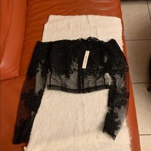 Sheer black off the shoulder blouse.Tags attached